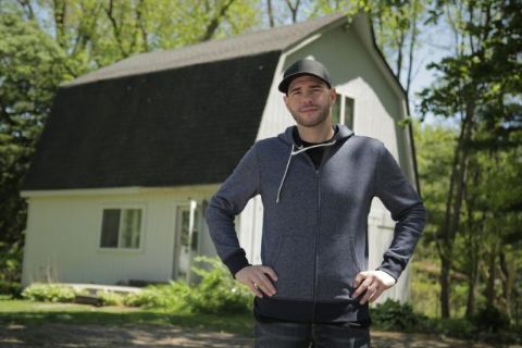 Steve Gonsalves poses a picture in a black hood.